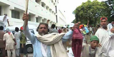 Troops clear PTV building of protesters, transmission resumes